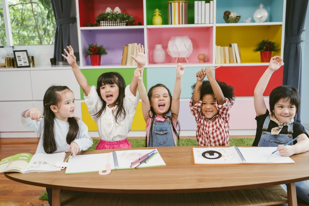 A group of excited, happy children.